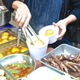 Yes those are stewed chicken feet on the right.
